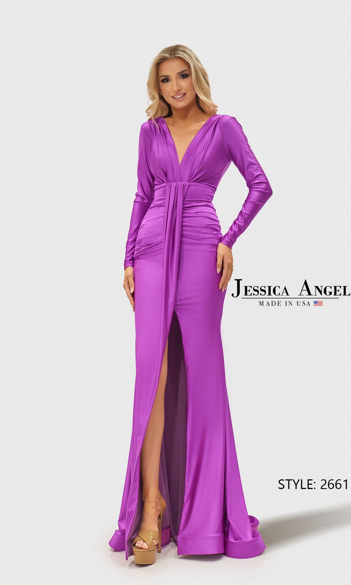 A woman smiles in the Jessica Angel 2661 long prom dress, featuring orchid color, long sleeves, a high front slit, and a gathered waist.